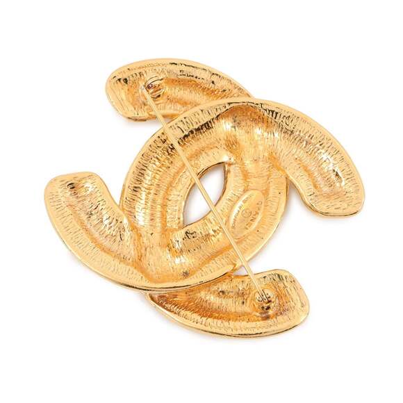 CHANEL Gold Logo Brooch
